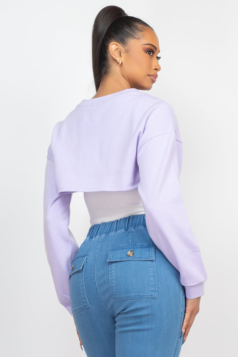 Top de canalé sin mangas con suéter tipo bolero